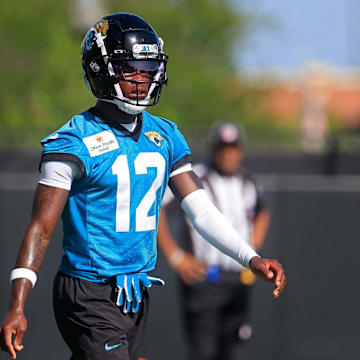 Jacksonville Jaguars wide receiver Travis Hunter (12) walks on the field during the second mandatory minicamp at Miller Electric Center Wednesday, June 11, 2025 in Jacksonville, Fla.