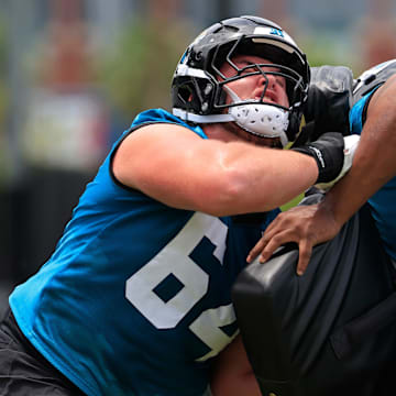 Jacksonville Jaguars guard Wyatt Milum (64), left, drills on guard Sal Wormley (61) during a rookie minicamp at Miller Electric Center Saturday, May 10, 2025 in Jacksonville, Fla. [Corey Perrine/Florida Times-Union]