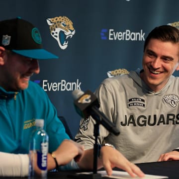 Jacksonville Jaguars general manager James Gladstone, right, smiles at head coach Liam Coen during a press conference at Miller Electric Center Tuesday, April 15, 2025 in Jacksonville, Fla. [Corey Perrine/Florida Times-Union]