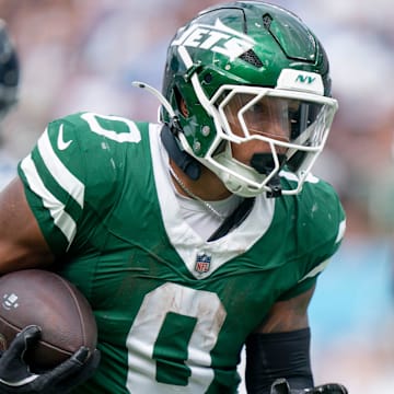 New York Jets running back Braelon Allen (0) runs for a touchdown against the Tennessee Titans during their game at Nissan Stadium in Nashville, Tenn., Sunday, Sept. 15, 2024.