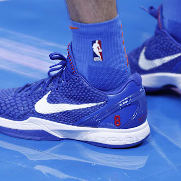 Oklahoma City Thunder guard Alex Caruso wears the Nike Kobe 6 Protro in the "Dodgers" colorway.