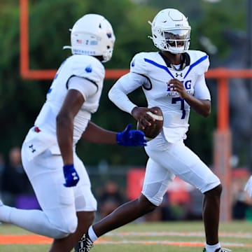 IMG Academy's Jayden Wade looks to pass during the first quarter of a high school football matchup at Mandarin High School.
