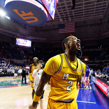 Jan 14, 2025; Gainesville, Florida, USA; Missouri Tigers guard Tamar Bates (2) screams toward the crowd after a game against the Florida Gators at Exactech Arena at the Stephen C. O'Connell Center. Mandatory Credit: Matt Pendleton-Imagn Images