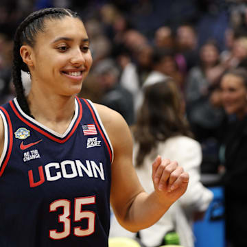 Apr 4, 2025; Tampa, FL, USA;  Connecticut Huskies guard Azzi Fudd (35) leaves the court after defeating the UCLA Bruins during the fourth quarter in a semifinal of the women's 2025 NCAA tournament at Amalie Arena.
