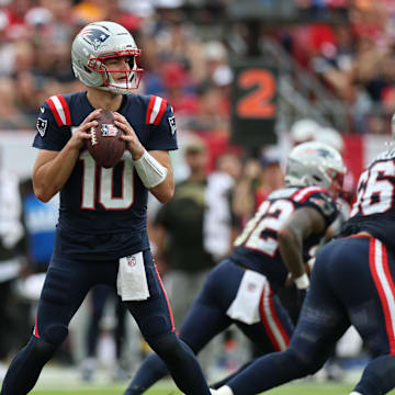 Nov 9, 2025; Tampa, Florida, USA; New England Patriots quarterback Drake Maye (10) throws downfield during the second quarter against the Tampa Bay Buccaneers at Raymond James Stadium. Mandatory Credit: Nathan Ray Seebeck-Imagn Images