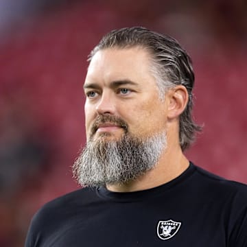 Aug 23, 2025; Glendale, Arizona, USA; Las Vegas Raiders offensive line coach Brennan Carroll against the Arizona Cardinals during a preseason NFL game at State Farm Stadium. Mandatory Credit: Mark J. Rebilas-Imagn Images