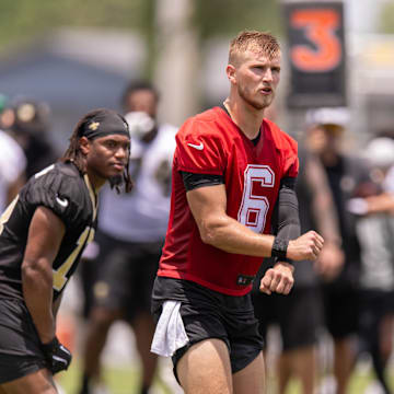 Jun 10, 2025; New Orleans, LA, USA;  New Orleans Saints quarterback Tyler Shough (6) gives a play call at the line during minicamp at Ochsner Sports Performance Center. Mandatory Credit: Stephen Lew-Imagn Images