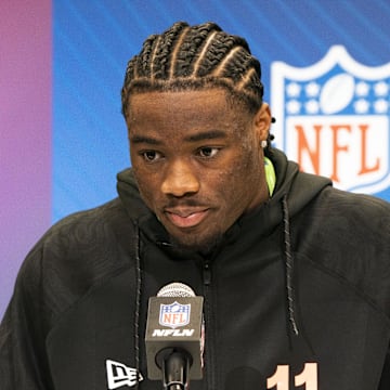 Alabama quarterback Jalen Milroe (QB11) talks to the press during the 2025 NFL Combine.
