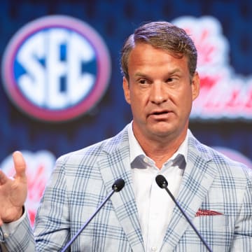 Jul 15, 2024; Dallas, TX, USA; Ole Miss head coach Lane Kiffin speaking at Omni Dallas Hotel. Mandatory Credit: Brett Patzke-USA TODAY Sports