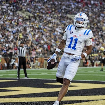 Sep 14, 2024; Winston-Salem, North Carolina, USA;  Mississippi Rebels wide receiver Jordan Watkins (11) runs in for a score against the Wake Forest Demon Deacons during the first half at Allegacy Federal Credit Union Stadium. Mandatory Credit: Jim Dedmon-Imagn Images