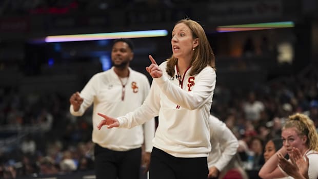 Mar 8, 2025; Indianapolis, IN, USA; USC Trojans head coach Lindsay Gottlieb communicate with her player as they play against 