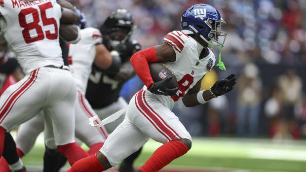 New York Giants wide receiver Malik Nabers (9) runs with the ball during the game against the Houston Texans 