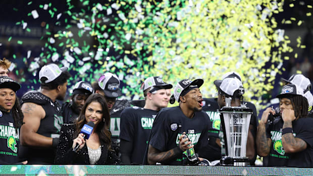 Dec 7, 2024; Indianapolis, IN, USA; The Oregon Ducks celebrate defeating the Penn State Nittany Lions to win the Big Ten Cham