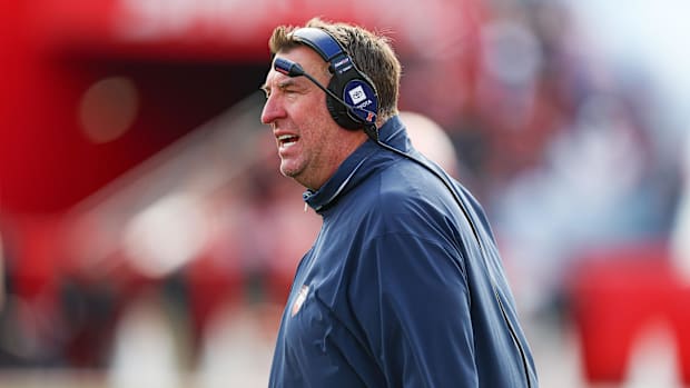 Nov 23, 2024; Piscataway, New Jersey, USA; Illinois Fighting Illini head coach Bret Bielema looks on during the first half ag