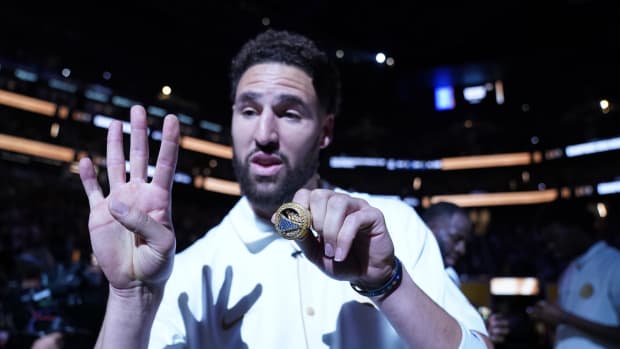 October 18, 2022; San Francisco, California, USA; Golden State Warriors guard Klay Thompson (11) receives his championship ring before the game against the Los Angeles Lakers at Chase Center. Mandatory Credit: Kyle Terada-USA TODAY Sports