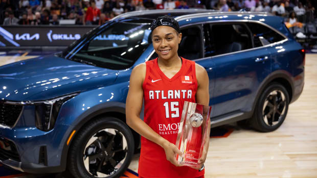 Allisha Gray with the trophy for the skills challenge