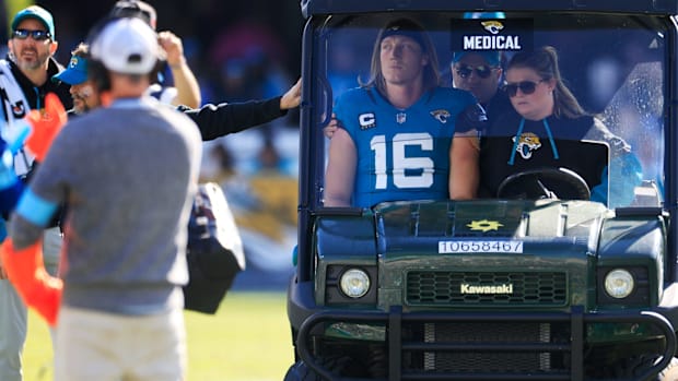 Trevor Lawrence gets carted off the field during a 2024 home gam
