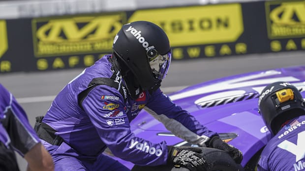 Christopher Bell's pit crew in action as they win the pit crew challenge during qualifying at North Wilkesboro Speedway.