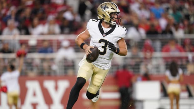 New Orleans Saints quarterback Jake Haener (3) looks to throw against the San Francisco 49ers 