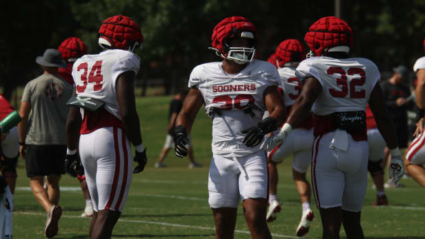 Oklahoma Sooners P.J. Adebawore, Trace Ford, R Mason Thomas