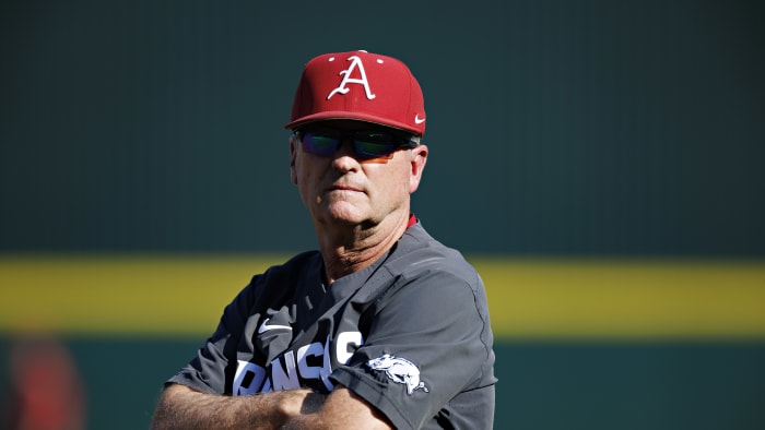 Arkansas Razorbacks coach Dave Van Horn stands on the field before a game against Tennessee at Baum-Walker Stadium in Fayetteville, Ark.