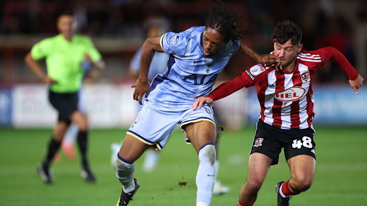 Damola Ajayi and Louie Cayless duel for the ball at St James' Park