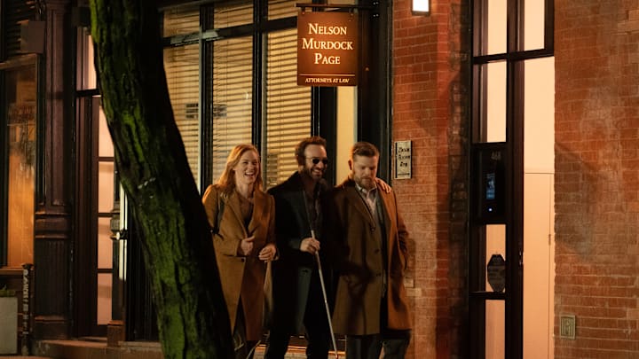 (L-R) Karen Page (Deborah Ann Woll), Daredevil/Matt Murdock (Charlie Cox) and Foggy Nelson (Elden Henson) in Marvel Television's DAREDEVIL: BORN AGAIN, exclusively on Disney+. Photo by Giovanni Rufino. © 2024 MARVEL.