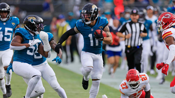 Jacksonville Jaguars wide receiver Parker Washington (11) rushes for yards during the first quarter of a preseason NFL football game Saturday, Aug. 10, 2024 at EverBank Stadium in Jacksonville, Fla. [Corey Perrine/Florida Times-Union]