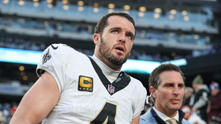 Dec 8, 2024; East Rutherford, New Jersey, USA; New Orleans Saints quarterback Derek Carr (4) walks off the field after field after an injury during the fourth quarter at MetLife Stadium. Mandatory Credit: Vincent Carchietta-Imagn Images
