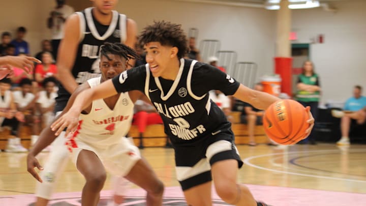 Taylen Kinney (0) dribbles by a defender during an AAU basketball game July 4, 2023, at the Nike EYBL Peach Jam in North Augusta, S.C. A Newport native, Kinney is a Class of 2026 recruit and holds a scholarship offer to play at Louisville.