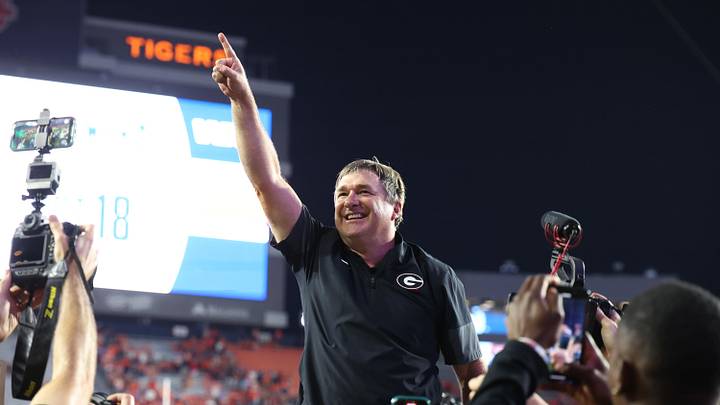 Oct 11, 2025; Auburn, Alabama, USA;  Georgia Bulldogs head coach Kirby Smart celebrates after the Bulldogs beat the Auburn Tigers at Jordan-Hare Stadium. Mandatory Credit: John Reed-Imagn Images
