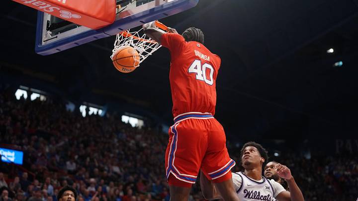 Kansas Jayhawks forward Flory Bidunga (40) dunks the ball against Kansas State Wildcats during the Sunflower Showdown game inside Allen Fieldhouse in Lawrence, Kansas, on Saturday, March 7, 2026.