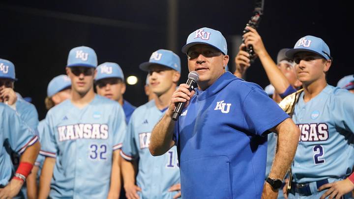 Kansas coach Dan Fitzgerald talks to the crowd after their 13-10 win over Arkansas during the NCAA regional tournament at Hoglund Ballpark in Lawrence, Kansas, on May 31, 2026.