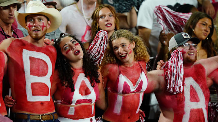 Sep 28, 2024; Tuscaloosa, Alabama, USA;  Alabama Crimson Tide fans sing during the third quarter against the Georgia Bulldogs at Bryant-Denny Stadium. Mandatory Credit: John David Mercer-Imagn Images