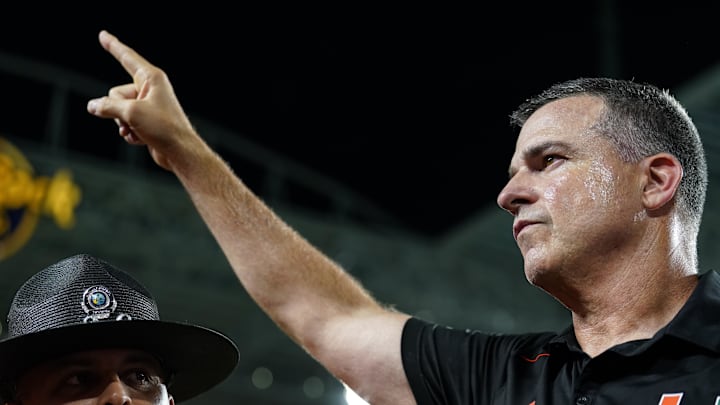 Oct 21, 2023; Miami Gardens, Florida, USA; Miami Hurricanes head coach Mario Cristobal celebrates after defeating the Clemson Tigers at Hard Rock Stadium. Mandatory Credit: Rich Storry-USA TODAY Sports
