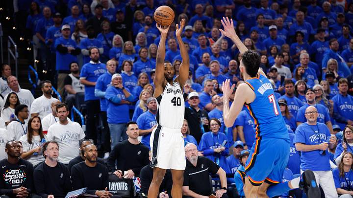 May 20, 2026; Oklahoma City, Oklahoma, USA; San Antonio Spurs forward Harrison Barnes (40) shoots as Oklahoma City Thunder center Chet Holmgren (7) defends during the second quarter during game two of the western conference finals for the 2026 NBA playoffs at Paycom Center. Mandatory Credit: Alonzo Adams-Imagn Images