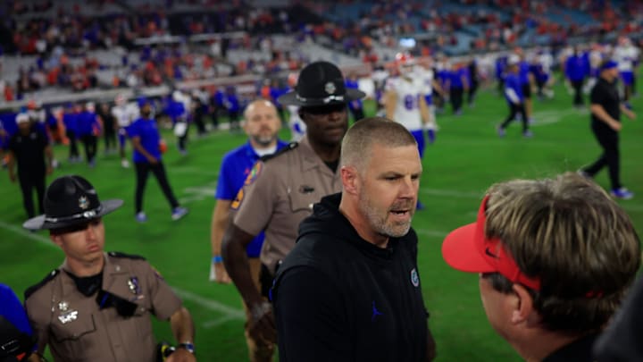 Florida Gators head coach Billy Napier and Georgia Bulldogs head coach Kirby Smart shake hands after the game of an NCAA college football matchup Saturday, Nov. 2, 2024 at EverBank Stadium in Jacksonville, Fla. The Georgia Bulldogs defeated the Florida Gators 34-20. [Corey Perrine/Florida Times-Union]