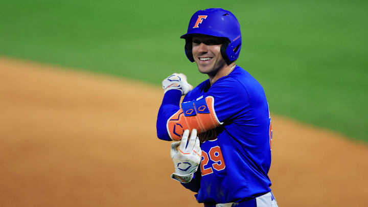 Florida catcher Brody Donay (29) smiles after a base hit during the eighth inning of an NCAA baseball matchup Monday, Feb. 17, 2025 at Jacksonville University in Jacksonville, Fla. Florida defeated Jacksonville 10-4. [Corey Perrine/Florida Times-Union]