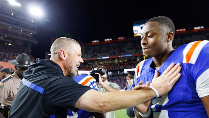 Oct 18, 2025; Gainesville, Florida, USA; Florida Gators head coach Billy Napier celebrates with quarterback DJ Lagway (2) after a game against the Mississippi State Bulldogs at Ben Hill Griffin Stadium. Mandatory Credit: Matt Pendleton-Imagn Images