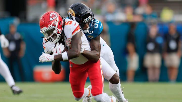 Jacksonville Jaguars cornerback Montaric Brown (30) tackles Kansas City Chiefs wide receiver Hollywood Brown (5) during the first quarter of a preseason NFL football game Saturday, Aug. 10, 2024 at EverBank Stadium in Jacksonville, Fla. [Corey Perrine/Florida Times-Union]