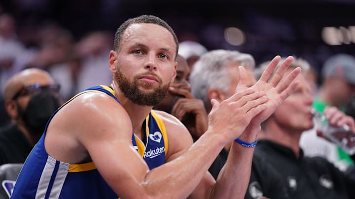 Apr 16, 2024; Sacramento, California, USA; Golden State Warriors guard Stephen Curry (30) sits on the bench during action against the Sacramento Kings in the fourth quarter during a play-in game of the 2024 NBA playoffs at the Golden 1 Center. Mandatory Credit: Cary Edmondson-Imagn Images