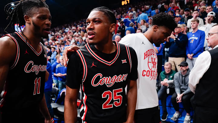 Houston Cougars guard Mercy Miller (25) looks back after being injured before the second half by Kansas Jayhawks during the game against Houston Cougars inside Allen Fieldhouse on Monday, Feb. 23, 2026.