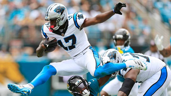 Carolina Panthers wide receiver Xavier Legette (17) leaps over Jacksonville Jaguars cornerback Jourdan Lewis (2) during the second quarter of an NFL football matchup at EverBank Stadium in Jacksonville, Fla., Sept. 7, 2025. The Jaguars defeated the Panthers 26-10.