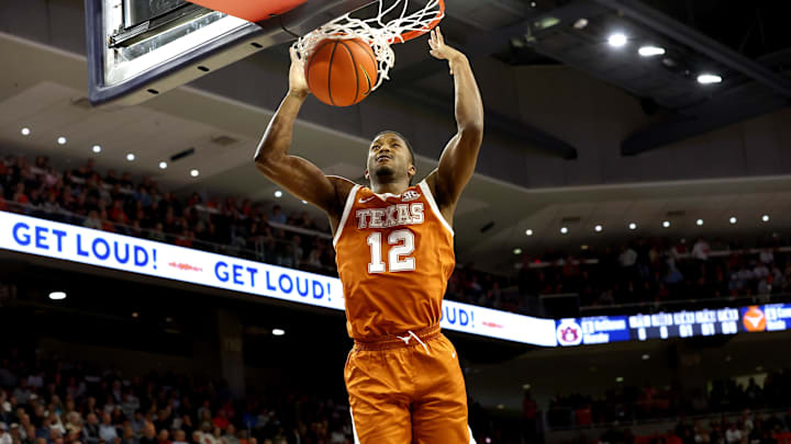 Jan 28, 2026; Auburn, Alabama, USA;  Texas Longhorns guard Tramon Mark (12) makes a dunk against the Auburn Tigers during the first half at Neville Arena. Mandatory Credit: John Reed-Imagn Images