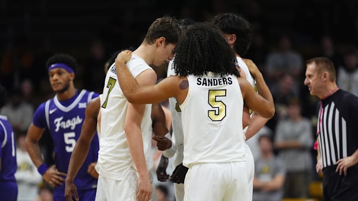 Feb 1, 2026; Boulder, Colorado, USA; Members of the against the Colorado Buffaloes huddle in the second half against the Texas Christian University Horned Frogs at the CU Events Center. Mandatory Credit: Ron Chenoy-Imagn Images