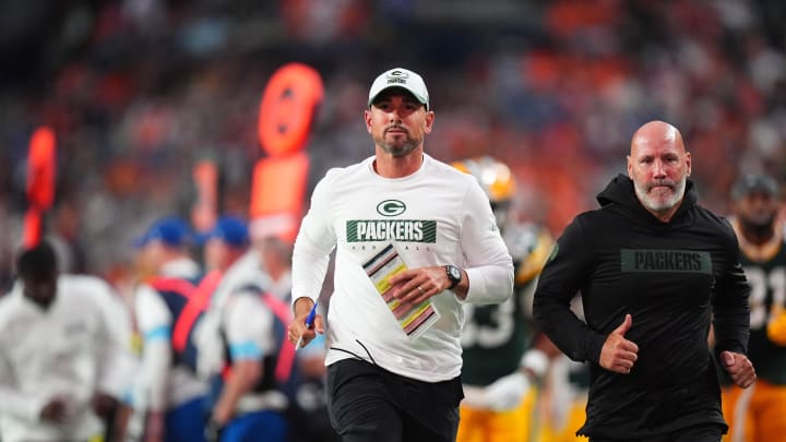 Aug 18, 2024; Denver, Colorado, USA; Green Bay Packers head coach Matt LaFleur leaves the field in the first half against the Denver Broncos at Empower Field at Mile High. Mandatory Credit: Ron Chenoy-USA TODAY Sports