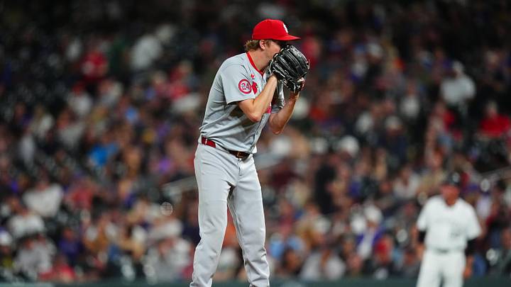 Sep 25, 2024; Denver, Colorado, USA; St. Louis Cardinals starting pitcher Erick Fedde (12) prepares to pitch in the fifth inning against the Colorado Rockies at Coors Field. Mandatory Credit: Ron Chenoy-Imagn Images