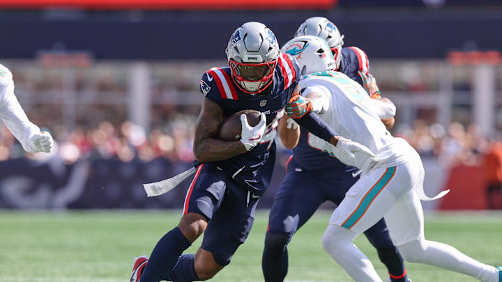 Oct 6, 2024; Foxborough, Massachusetts, USA; New England Patriots wide receiver Kendrick Bourne (84) runs the ball during the first half against the Miami Dolphins at Gillette Stadium. Mandatory Credit: Paul Rutherford-Imagn Images