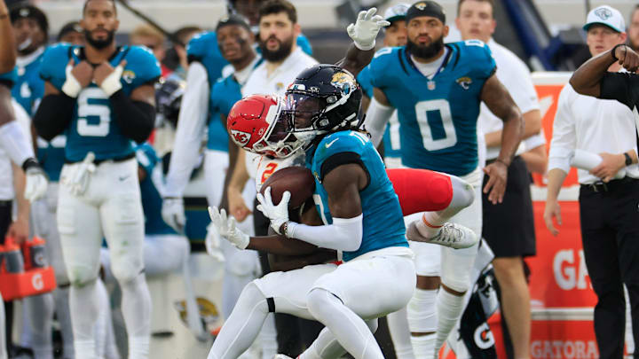 Jacksonville Jaguars wide receiver Brian Thomas Jr. (7) hauls in a reception against Kansas City Chiefs cornerback Joshua Williams (2) during the first quarter of a preseason NFL football game Saturday, Aug. 10, 2024 at EverBank Stadium in Jacksonville, Fla. 