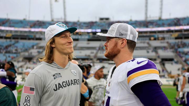 Jacksonville Jaguars quarterback Trevor Lawrence (16), left, and Minnesota Vikings quarterback Sam Darnold (14) talk after the game of an NFL football matchup Sunday, Nov. 10, 2024 at Everbank Stadium in Jacksonville, Fla. The Vikings defeated the Jaguars 12-7. [Corey Perrine/Florida Times-Union]